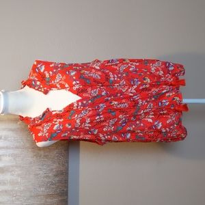 En Creme red floral cross over top